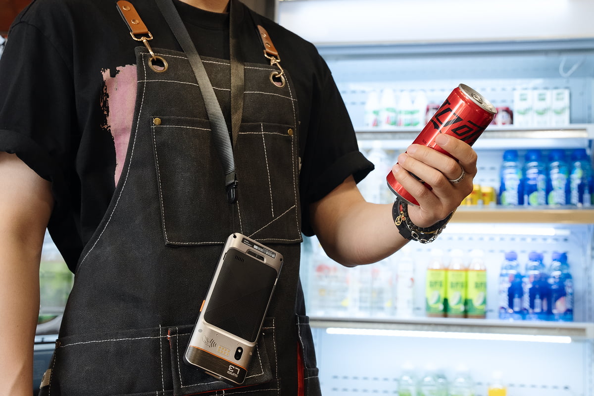 Sunmi L3 on a lanyard used for stocktaking a fridge in a store