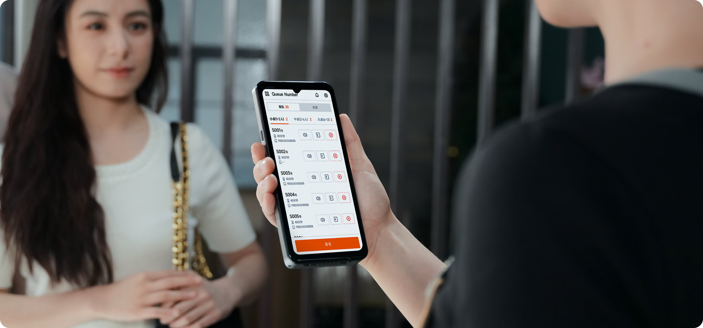 Sunmi M3 used for queue number management at a restaurant front